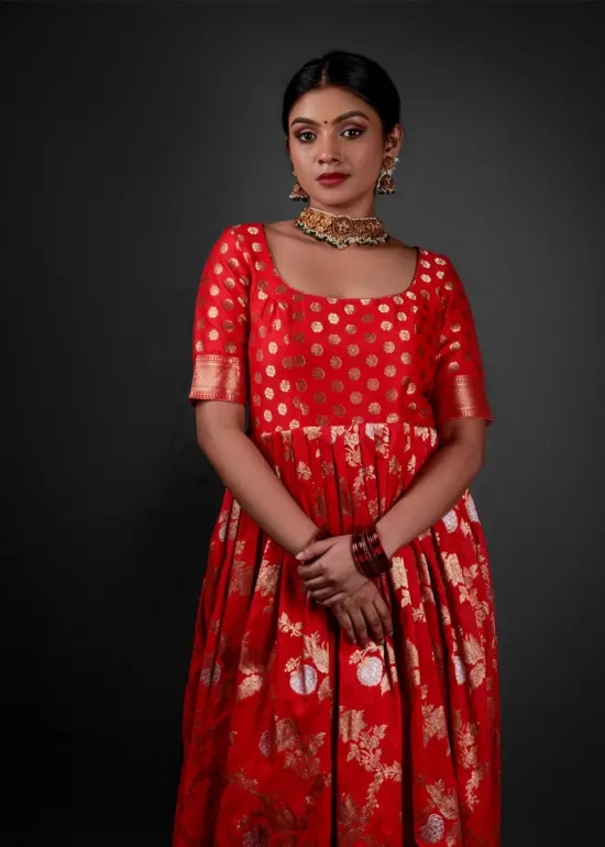 "Close-up of the flowing fabric of a Banarasi georgette dress, showcasing its luxurious texture."By Mirra Clothing