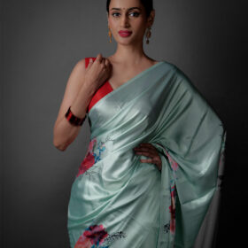 Close up view of a model showcasing Sea Green Printed Satin Saree , Relaxed style for everyday outings by Mirra Clothing