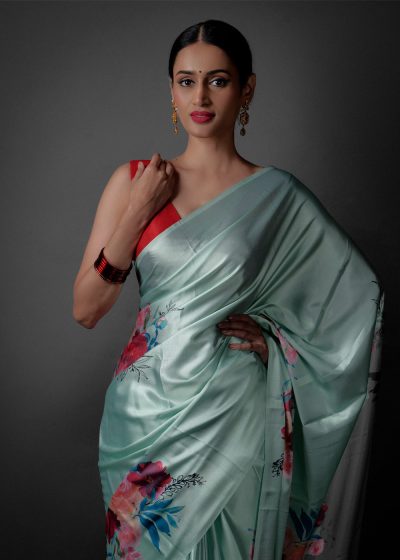Close up view of a model showcasing Sea Green Printed Satin Saree , Relaxed style for everyday outings by Mirra Clothing