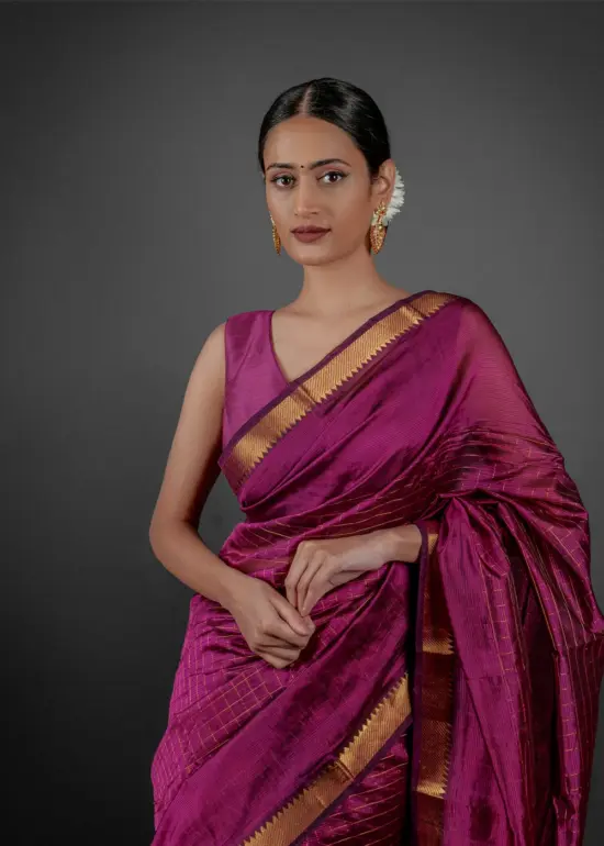 Front view of a model showcasing a Magenta Handwoven Mangalagiri Silk Saree, Suitable For Weddings & Receptions