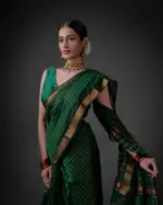 A model wearing a Bottle Green Mangalagiri silk saree by Mirra Clothing