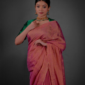 Close up view of a model showcasing Ombre Pink Tissue Linen Saree , elegant for grand occasions By Mirra Clothing