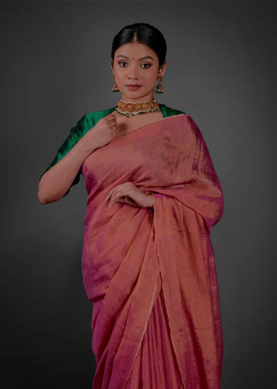 Close up view of a model showcasing Ombre Pink Tissue Linen Saree , elegant for grand occasions By Mirra Clothing