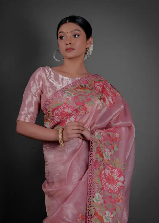 Close up view of a model showcasing Pink Tissue Silk Saree with Cutwork Embroidery, Elegant wear for festive occasions By Mirra Clothing
