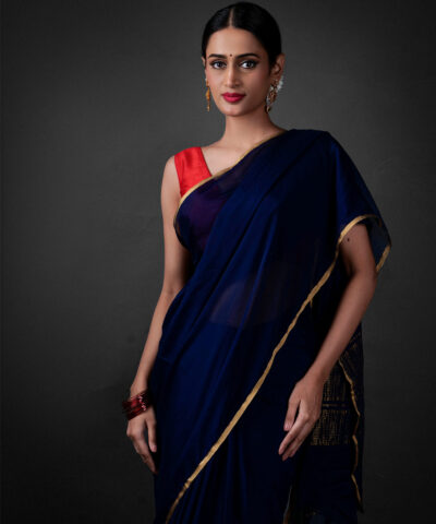 "Close up view of a model showcasing Navy Blue Chiffon Silk Saree , perfect for casual outings. By MirraClothing