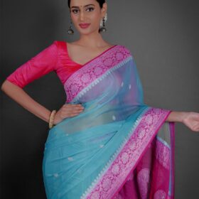 "A breezy mint Blue chiffon saree with a lightweight feel, ideal for a casual outing or daytime celebration."By Mirra Clothing