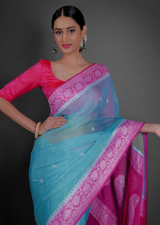"A breezy mint Blue chiffon saree with a lightweight feel, ideal for a casual outing or daytime celebration."By Mirra Clothing