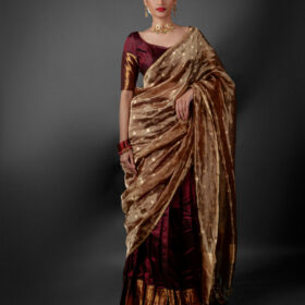 Front view of a model showcasing a Coffee Brown Silk Half Saree Set with Tissue Silk Dupatta, Designed for traditional festivals By Mirra Clothing