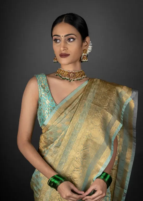 Pista green tissue silk saree by Mirra Clothing