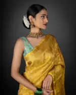 Yellow Crushed Tissue Silk Saree highlighted with Gold Zari Weaves by Mirra Clothing