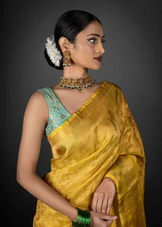 Yellow Crushed Tissue Silk Saree highlighted with Gold Zari Weaves by Mirra Clothing