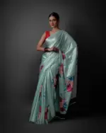 Full view of a model showcasing Sea Green Printed Satin Saree , Comfortable saree for travel by Mirra Clothing