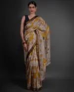 Full view of a model showcasing Yellow Kalamkari Printed Mangalagiri Silk Saree, suitable for festive wear By Mirra Clothing