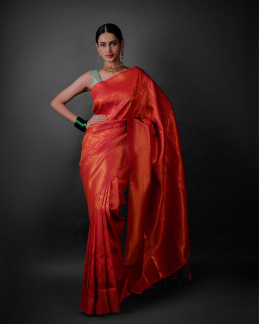 Front view of a model showcasing a Pink Banarasi Silk Saree with Zari Weaves , Suitable for art, dance, or craft workshops By Mirra Clothing