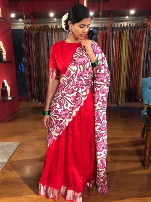 Full view of a model showcasing Red Silk Half Saree set with cotton silk blouse and scallop dupatta, elegant for grand occasions