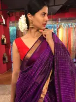 Front view of a model showcasing a Purple Mangalagiri Silk Saree Handwoven in Gold Zari Chequered Pattern, Suitable for Anniversaries & Special Milestones By Mirra Clothing