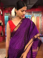 Full view of a model showcasing Purple Mangalagiri Silk Saree Handwoven in Gold Zari Chequered Pattern, Suitable for Formal Gatherings & Award Functions By Mirra Clothing