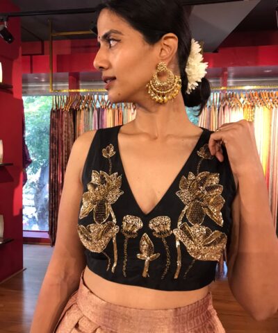 Close up view of a model showcasing Dusty Pink Crop Top and Lehenga (Set of 2), Glamorous Event Outfit By Mirra C;lothing