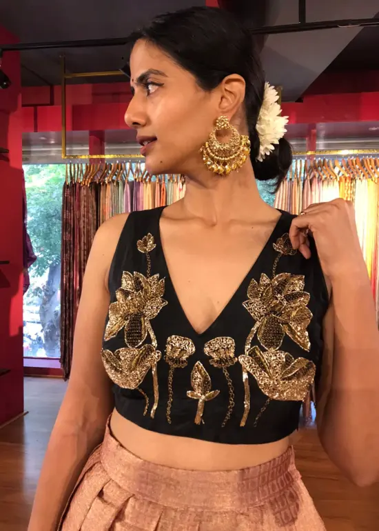 Close up view of a model showcasing Dusty Pink Crop Top and Lehenga (Set of 2), Glamorous Event Outfit By Mirra C;lothing