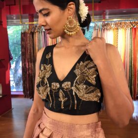 Side view of a model showcasing Black Hand Embroidered Silk Blouse, Embroidered Traditional Blouse By Mirra Clothing