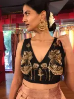 Front view of a model showcasing a Black Hand Embroidered Silk Blouse, perfect for festive occassions By Mirra Clothing