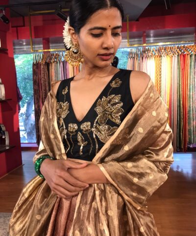 Close up view of a model showcasing Dusty Pink Half Saree Silk Lehenga Set, Well-suited for Traditional Events By Mirra Clothing