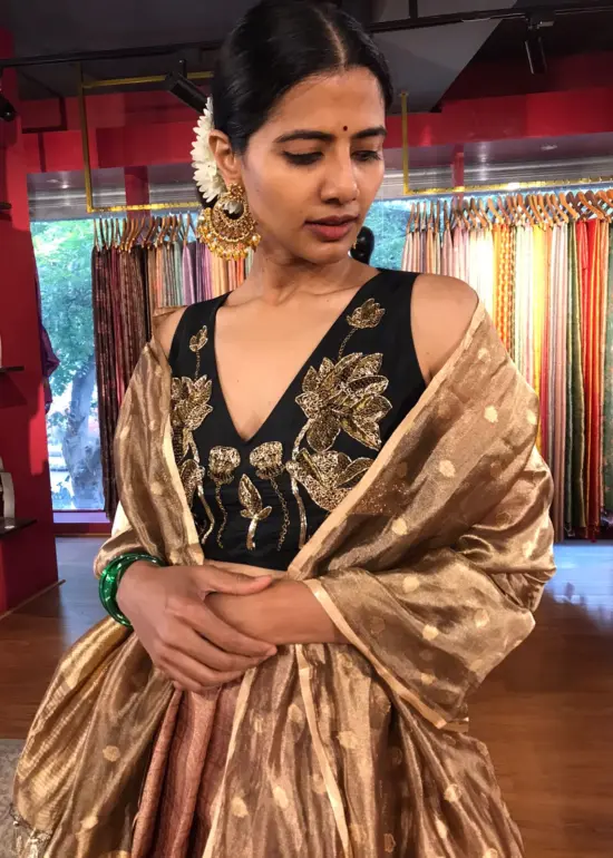 Close up view of a model showcasing Dusty Pink Half Saree Silk Lehenga Set, Well-suited for Traditional Events By Mirra Clothing