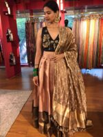"Front view of a model showcasing a Dusty Pink Half Saree Silk Lehenga Set, Suitable for Joyful Occasion Outfit By Mirra Clothing