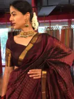 Front view of a model showcasing a Brown Mangalagiri Silk Saree woven in Gold Zari Checks, Suitable for Festivals like Diwali & Durga Puja by Mirra Clothing