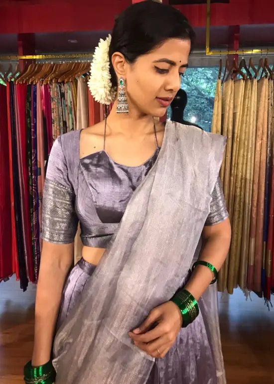 "Close up view of a model showcasing Lilac Silk Half Saree Set with Tissue Silk Dupatta (Set of 3), Ready for festive gatherings "by Mirra Clothing