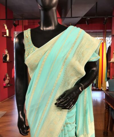 Sea Green Georgette Saree with Gold Zari Weaves