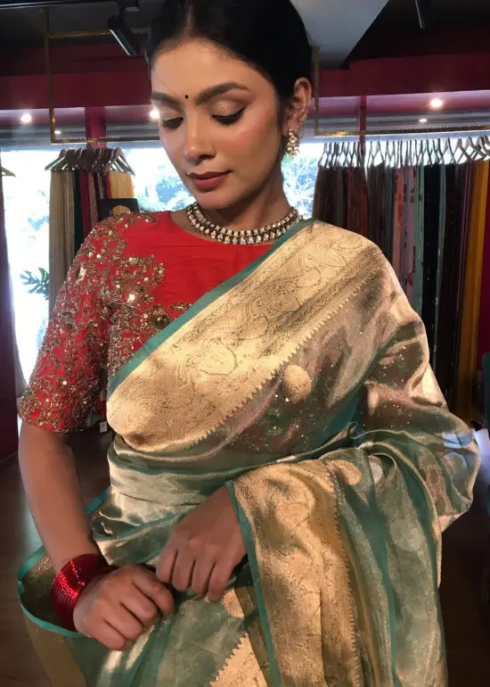 Sea Green Handwoven Tissue Silk Saree with Kadhwa Zari Motifs