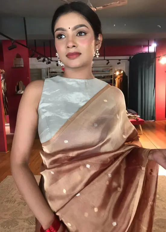 Nude Brown Tissue Silk Saree with Gold Zari Buttis