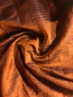 Close up view of a model showcasing Honey Orange Mangalagiri Silk Saree Handwoven in Gold Zari Chequered Pattern, Suitable For Housewarming (Griha Pravesh) By Mirra Clothing