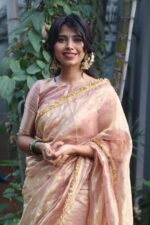 Dusty Pink Tissue Silk Saree woven with Beautiful Gold Zari Buttis