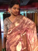 Light Pink Tissue Silk Saree woven with Beautiful Gold Zari Buttis