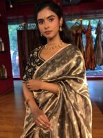 Metallic Gold Tissue Silk Saree woven with Beautiful Gold Zari Buttis