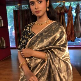 Metallic Gold Tissue Silk Saree woven with Beautiful Gold Zari Buttis