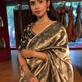 Metallic Gold Tissue Silk Saree woven with Beautiful Gold Zari Buttis